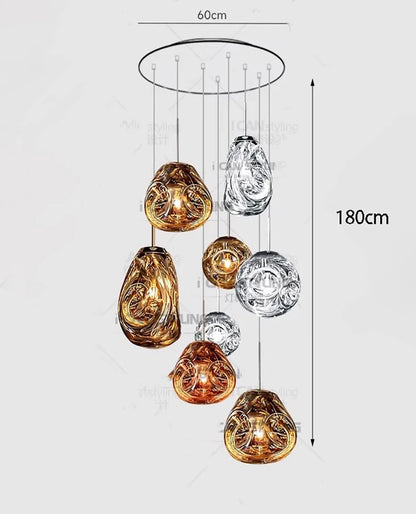Glass heads hung at mixed lengths from a brushed steel chassis