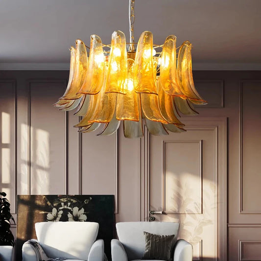 Vintage amber stained glass chandelier with tiered shades on an iron frame