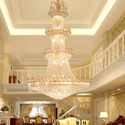 Gold framed crystal chandelier hung on a chain pendant from the ceiling