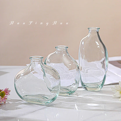 Brown glass vase with plant arrangement rustic home decor