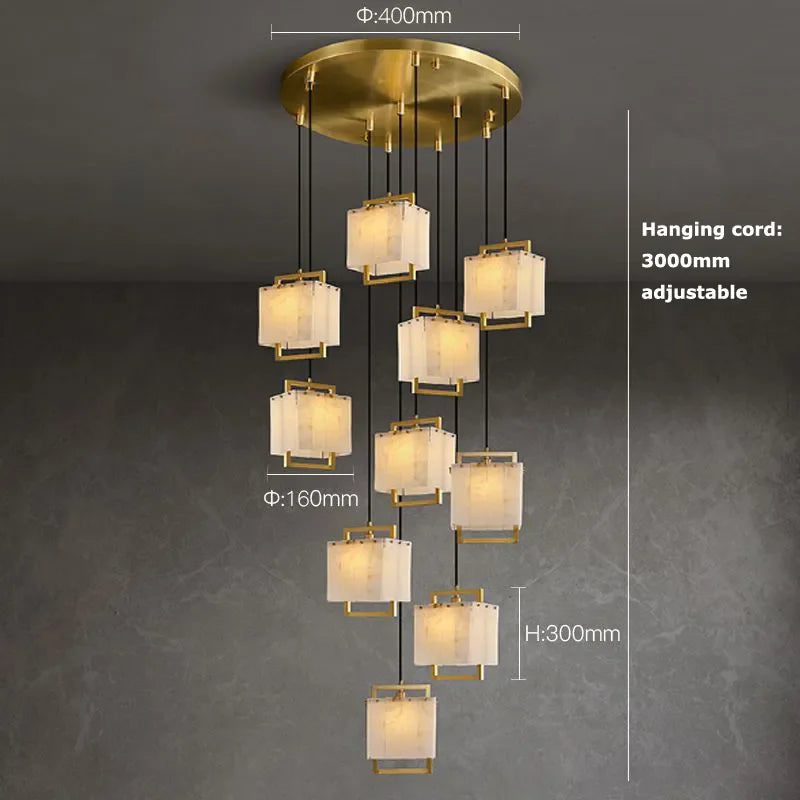 Three color dimmable marble chandelier in a gold steel finish
