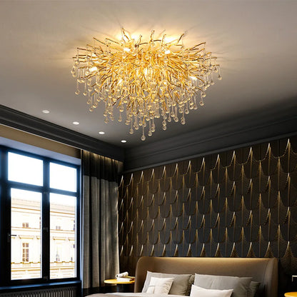 Polished gold crystal chandelier shade detail with clear glass crystal strands