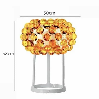 Transparent bead detail on the polished chrome chandelier frame