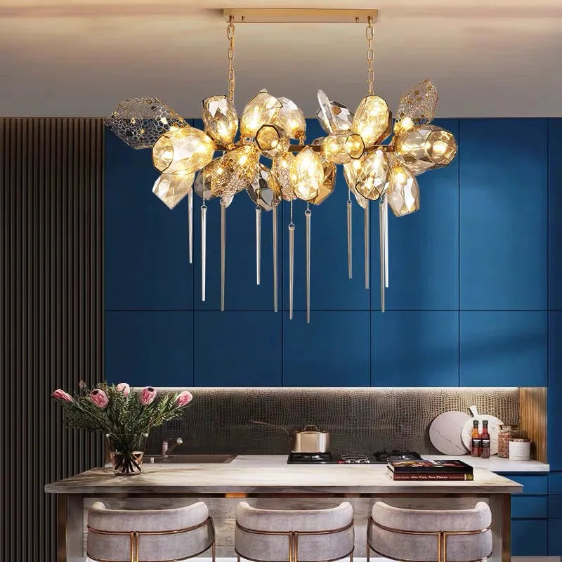 Glass shade detail with a 5W G9 LED bulb on a plated metal chandelier