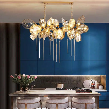 Glass shade detail with a 5W G9 LED bulb on a plated metal chandelier