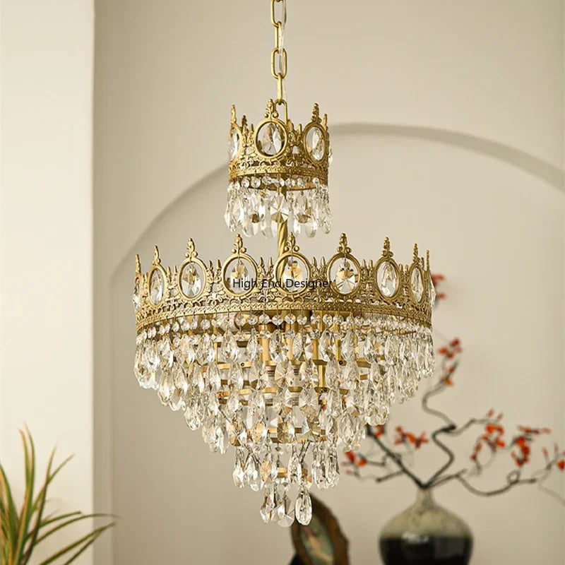 Golden crown crystal chandelier with an open iron frame and crystal