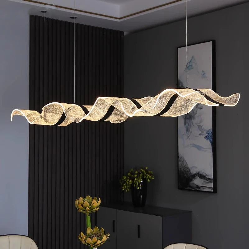 Gold linear chandelier 39.4 in long giving one continuous line of light