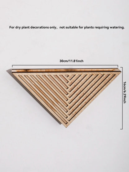 Side view of wooden geometric planter showing triangular form and depth