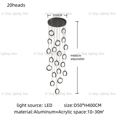 Twelve ring staircase chandelier suspended at staggered cord heights