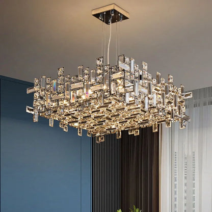 Crystal island chandelier in neutral 4500K light over a kitchen counter