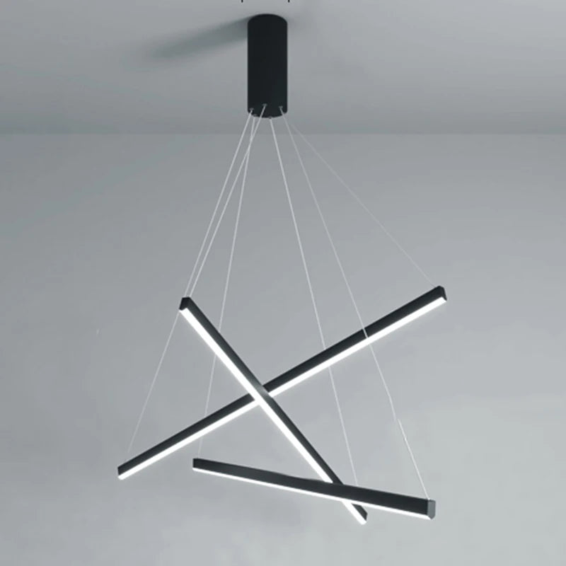 Staggered metal pendant chandelier with warm white wedge base LED light