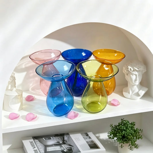 Blue glass avocado-shaped hydroponic planter for sprouting avocado seeds indoors