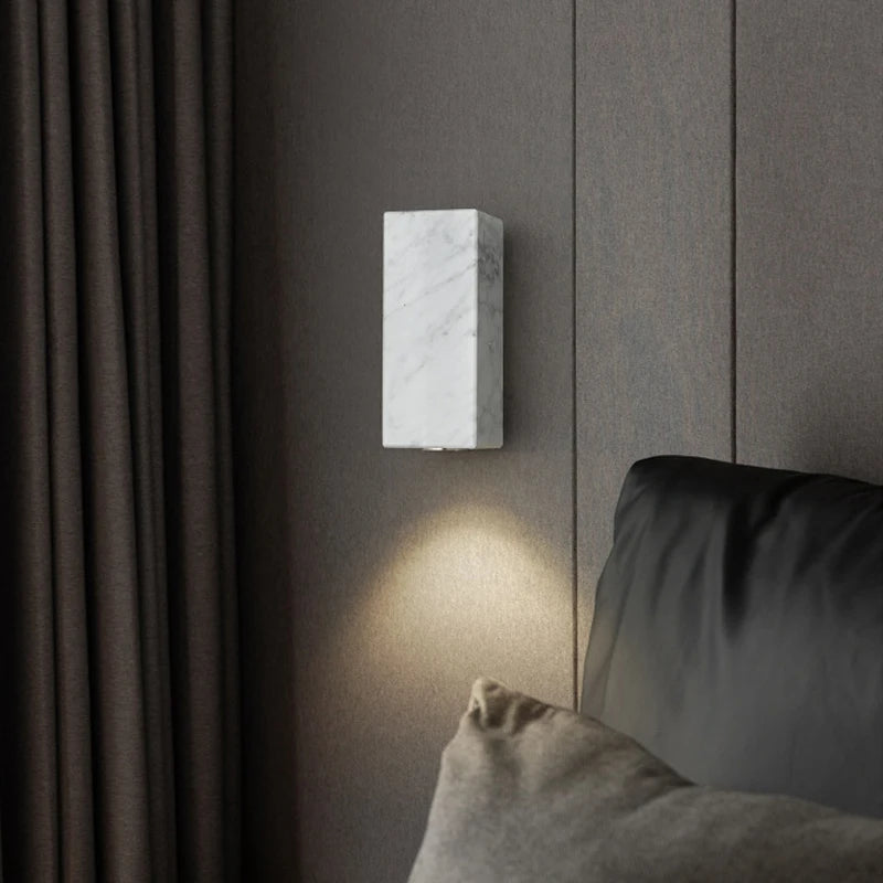 black marble wall sconce, side profile showing mounting depth
