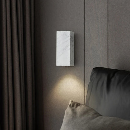 black marble wall sconce, side profile showing mounting depth