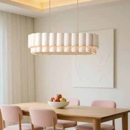 Wabi sabi fabric chandelier with a cloth shade on a painted iron frame