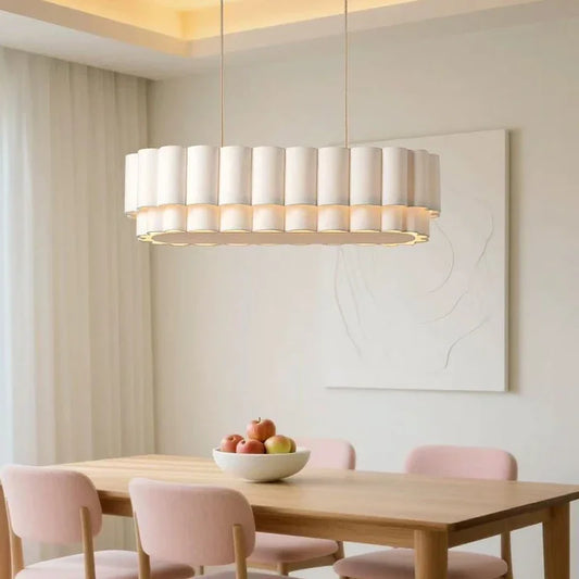 Wabi sabi fabric chandelier with a cloth shade on a painted iron frame