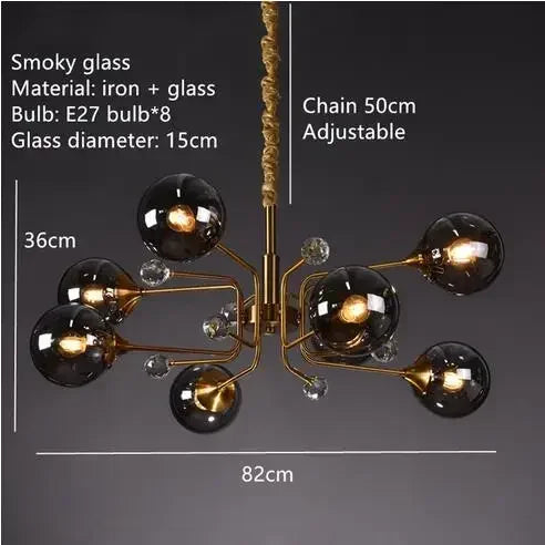 Single globe glass bubble chandelier with a clear shade on a chrome stem