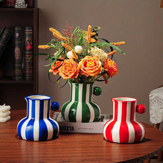 Red striped ceramic flower vase large size on table