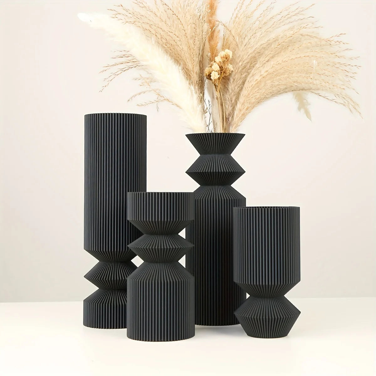 Nordic matte black plastic vase in XL size on a Scandi living shelf