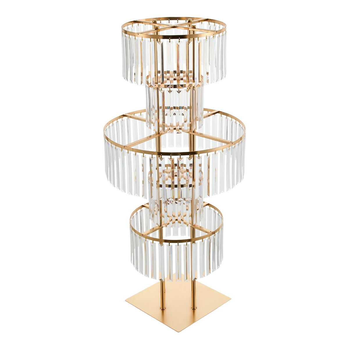 Two gold flower stands flanking a wedding reception table with floral arrangement