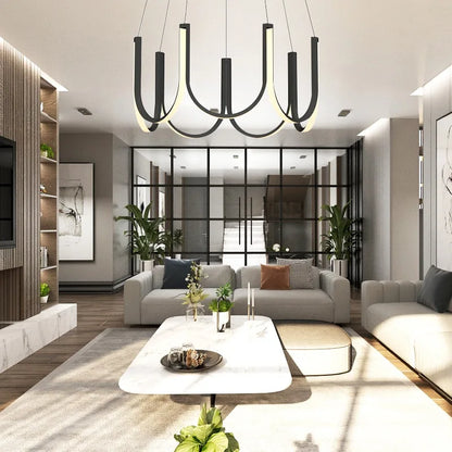 Gold U shaped chandelier with an acrylic diffuser and aluminum frame