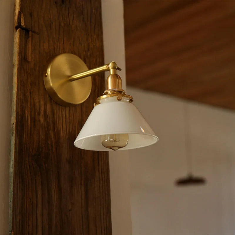 glass bathroom wall sconce, close-up of shade and hardware detail