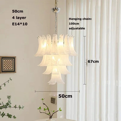 Stained glass chandelier shades opening outward from a central steel stem
