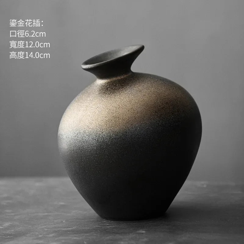 Close-up of minimal abstract stone terracotta vase with narrow opening