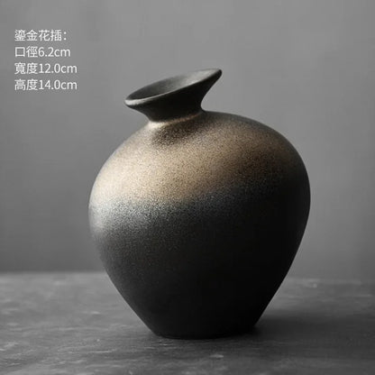 Close-up of minimal abstract stone terracotta vase with narrow opening