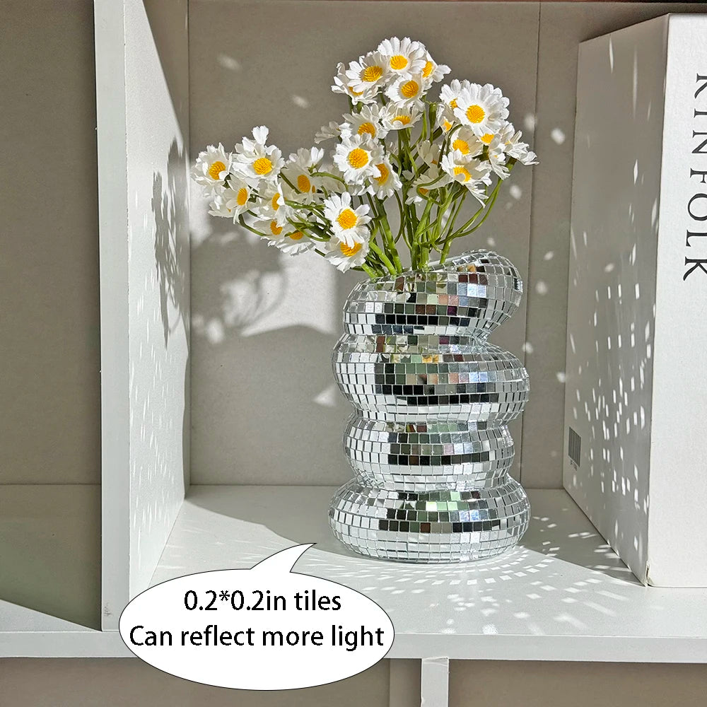 Silver mirror mosaic vase reflecting light in a maximalist eclectic styled room