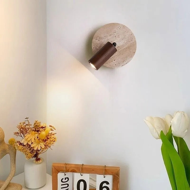 stone wall sconce, installed in a room interior setting