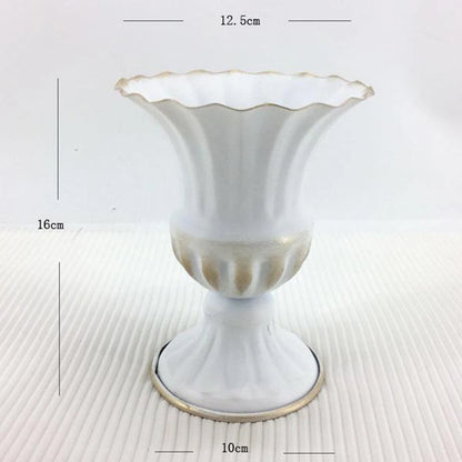 Side view of 12x15.5cm gold metal vase showing tall elegant tapered silhouette