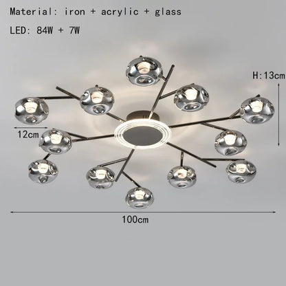 Nordic minimalist glass ball chandelier with a gold plated metal body