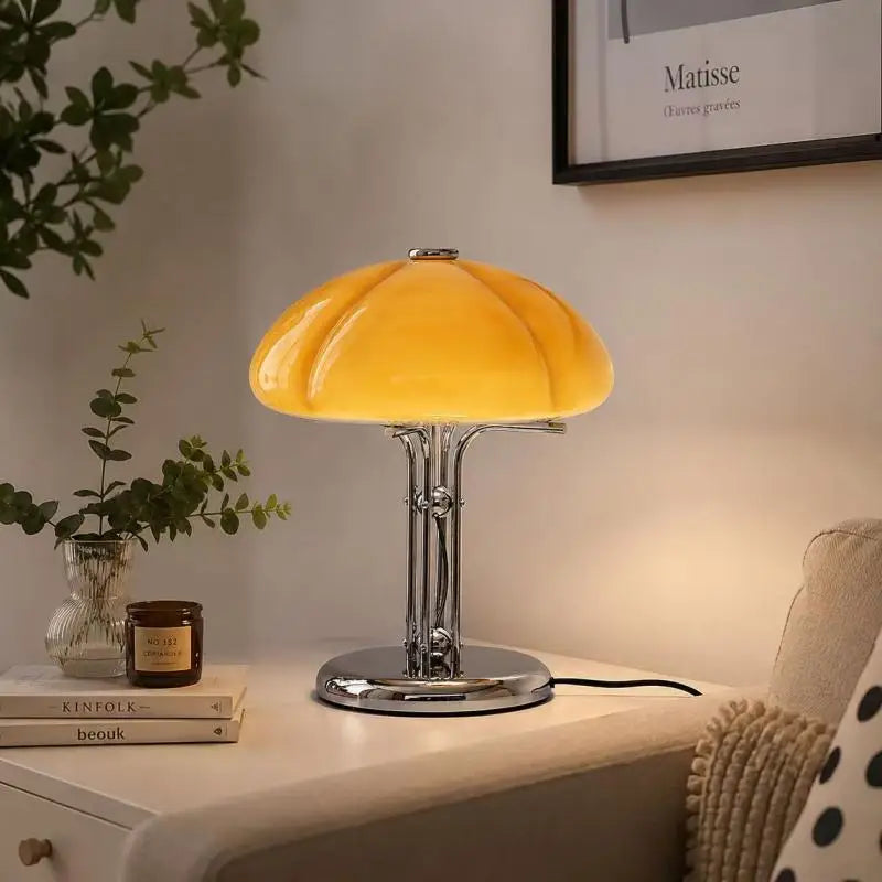 Orange glass mushroom shade close-up showing vintage blown glass texture