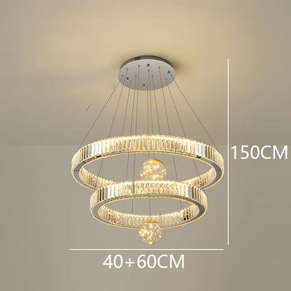 Crystal wrapped rings stacked on a brushed stainless chandelier frame