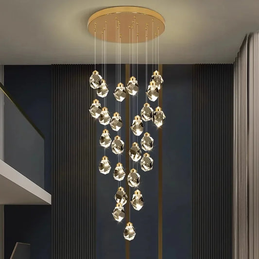 Modern crystal staircase chandelier with lit crystal heads on an iron frame