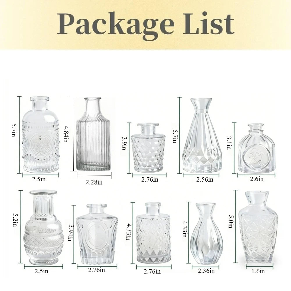 Mix of clear and amber relief mini glass vases in tabletop arrangement