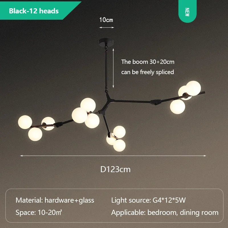 Glass ball branch chandelier shown lit in warm G9 LED light