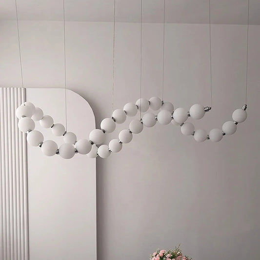 Minimalist linear strip chandelier with an acrylic diffuser bar