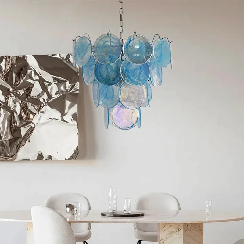 Blue stained glass chandelier with a polished chrome metal frame