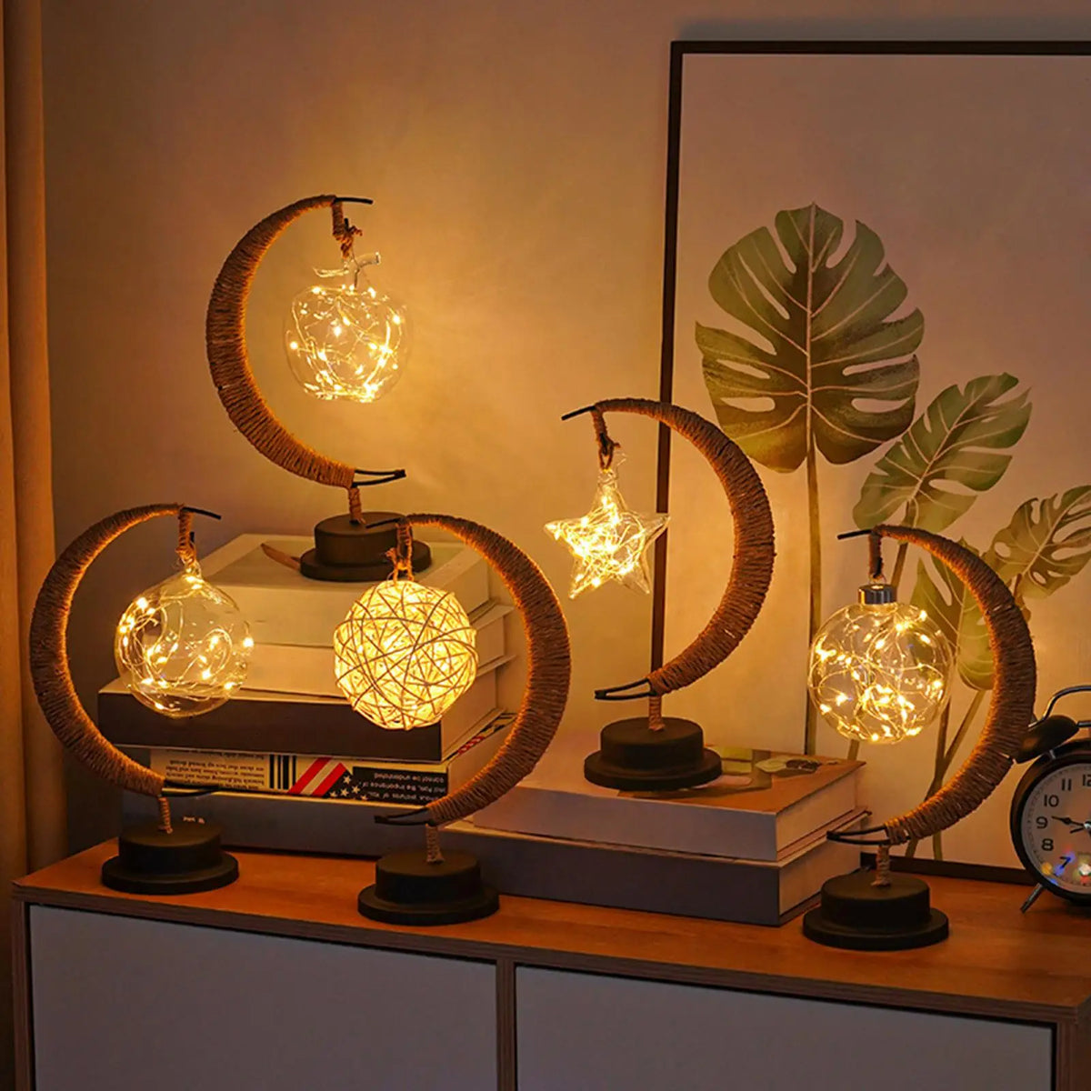 USB fairy moon night light in glass fruit design on bedroom shelf