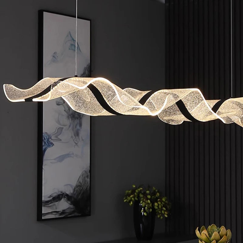 Cold white light along the PMMA diffuser of a wave chandelier