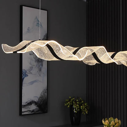Cold white light along the PMMA diffuser of a wave chandelier