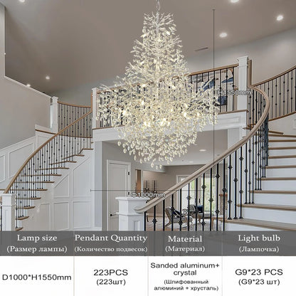 Clear crystal drops arranged along the chandelier slender metal branches