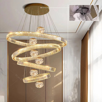 Gold concentric ring chandelier with a 118.1 in adjustable drop