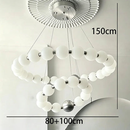 Silvery two ring chandelier, 31.5 and 39.4 in across, on cords