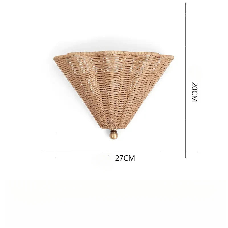 rattan wall sconce, detail view of fixture base and arm