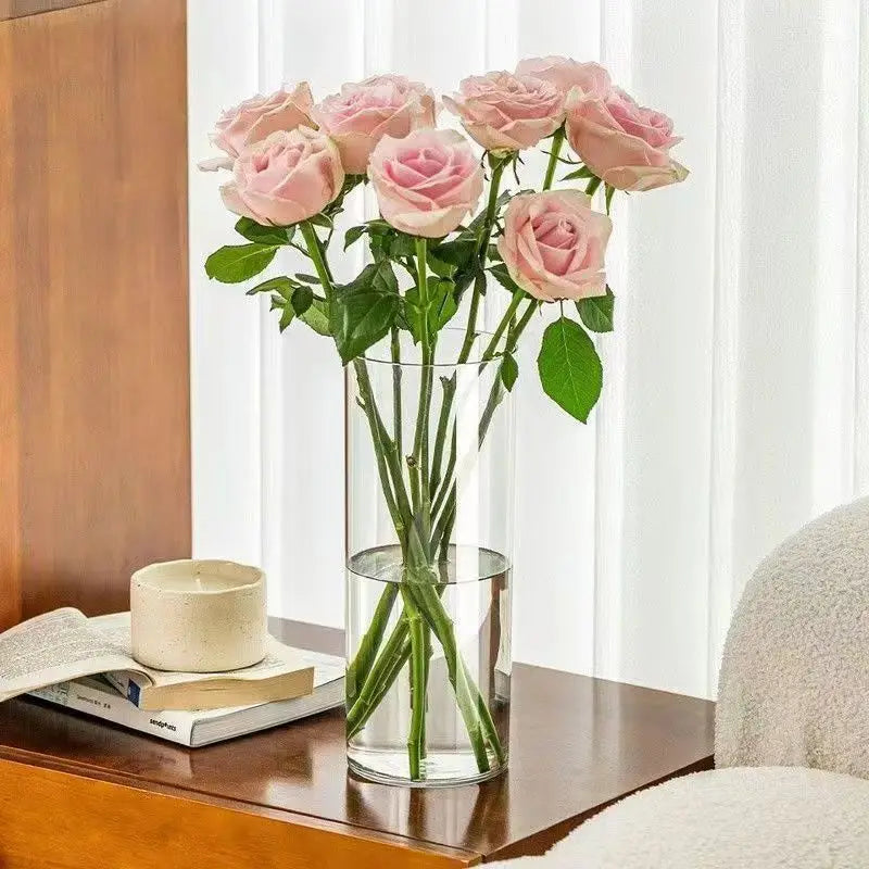 Set of three acrylic cylinder vases in small medium and large heights