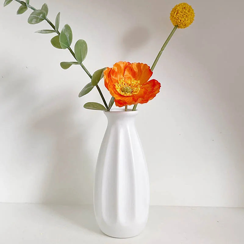 Retro ceramic flower holder white on Scandinavian shelf