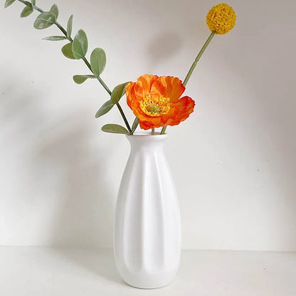 Retro ceramic flower holder white on Scandinavian shelf